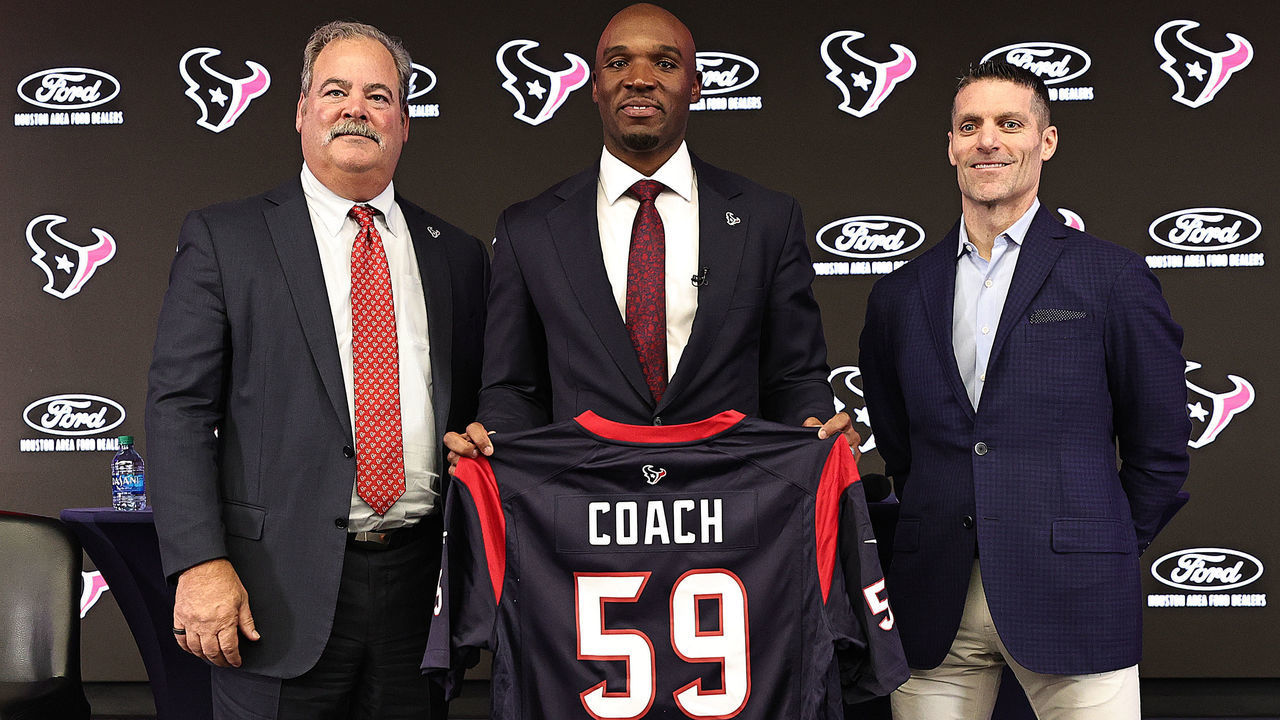 HOUSTON, TEXAS - FEBRUARY 02: DeMeco Ryans (C) is introduced as the Houston Texans head coach by Chairman and CEO Cal McNair (L) and general manager Nick Caserio at NRG Stadium on February 02, 2023 in Houston, Texas.
