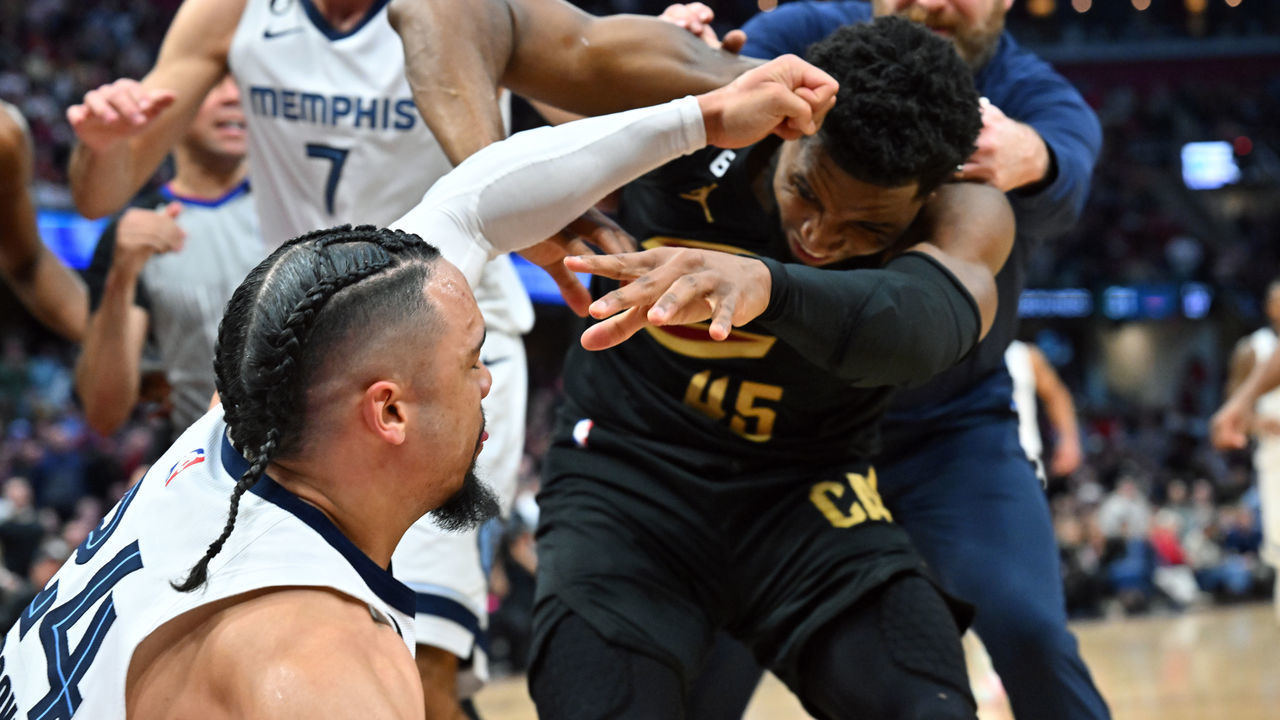 CLEVELAND, OHIO - FEBRUARY 02: Dillon Brooks #24 of the Memphis Grizzlies fights with Donovan Mitchell #45 of the Cleveland Cavaliers during the third quarter at Rocket Mortgage Fieldhouse on February 02, 2023 in Cleveland, Ohio. Both players were ejected.The Cavaliers defeated the Grizzlies 128-113.