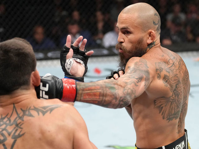 SAN DIEGO, CALIFORNIA - AUGUST 13: (R-L) Marlon Vera of Ecuador punches Dominick Cruz in a bantamweight fight during the UFC Fight Night event at Pechanga Arena on August 13, 2022 in San Diego, California.