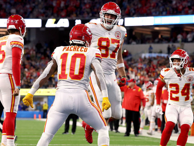 INGLEWOOD, CALIFORNIA - NOVEMBER 20: Travis Kelce #87 of the Kansas City Chiefs celebrates his touchdown catch with Isiah Pacheco #10, to take a 23-20 lead over the Los Angeles Chargers, during a 30-27 Chiefs win at SoFi Stadium on November 20, 2022 in Inglewood, California.