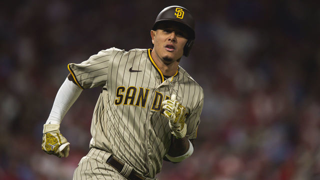 PHILADELPHIA, PENNSYLVANIA - OCTOBER 22: Manny Machado #13 of the San Diego Padres hits a home run in the first inning of Game Four of the National League Championship Series against the Philadelphia Phillies at Citizens Bank Park on October 22, 2022 in Philadelphia, Pennsylvania.