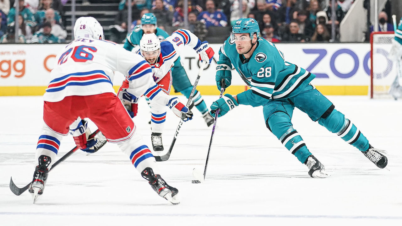 SAN JOSE, CA - NOVEMBER 19: Timo Meier #28 of the San Jose Sharks skates ahead with the puck against the New York Rangers at SAP Center on November 19, 2022 in San Jose, California.