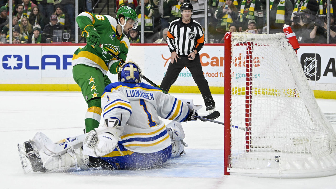 ST. PAUL, MN - JANUARY 28: Minnesota Wild Right Wing Mats Zuccarello (36) beats Buffalo Sabres Goalie Ukko-Pekka Luukkonen (1) for a goal during a shootout in game between the Minnesota Wild and Buffalo Sabres on January 28, 2023, at Xcel Energy Center in St. Paul, MN.