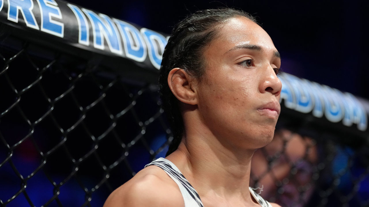SINGAPORE, SINGAPORE - JUNE 12: Taila Santos of Brazil prepares to fight Valentina Shevchenko of Kyrgyzstan in the UFC flyweight championship fight during the UFC 275 event at Singapore Indoor Stadium on June 12, 2022 in Singapore.