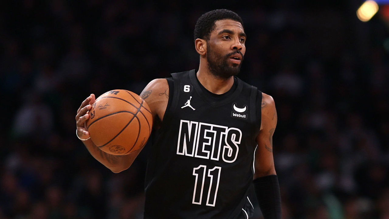 BOSTON, MASSACHUSETTS - FEBRUARY 01: Kyrie Irving #11 of the Brooklyn Nets dribbles against the Boston Celtics during the first half at TD Garden on February 01, 2023 in Boston, Massachusetts.