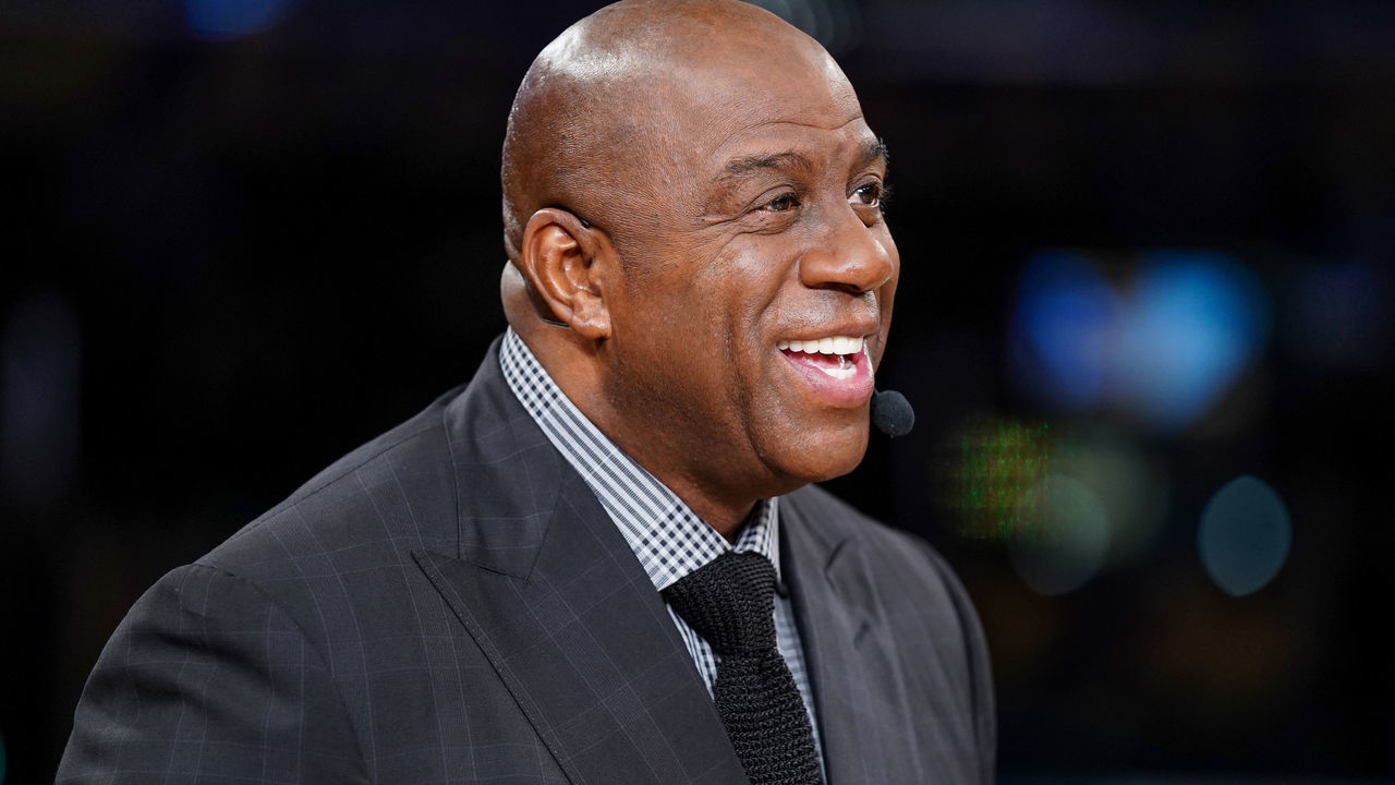 LOS ANGELES, CA - MARCH 5: ESPN Analyst, Magic Johnson looks on before the game between the Golden State Warriors and Los Angeles Lakers on March 5, 2022 at Crypto.Com Arena in Los Angeles, California. NOTE TO USER: User expressly acknowledges and agrees that, by downloading and/or using this Photograph, user is consenting to the terms and conditions of the Getty Images License Agreement. Mandatory Copyright Notice: Copyright 2022 NBAE