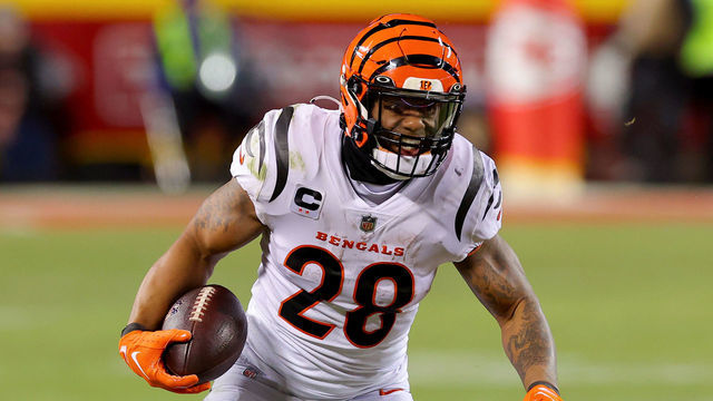 KANSAS CITY, MISSOURI - JANUARY 29: Joe Mixon #28 of the Cincinnati Bengals carries the ball against the Kansas City Chiefs during the third quarter in the AFC Championship Game at GEHA Field at Arrowhead Stadium on January 29, 2023 in Kansas City, Missouri.