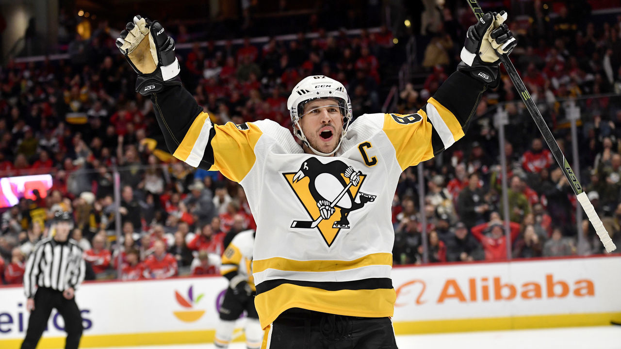 WASHINGTON, DC - JANUARY 26: Penguins center Sidney Crosby (87) celebrates after the Penguins tie the game at 2-2 during the third period during the Pittsburgh Penguins versus Washington Capitals National Hockey League game on January 26, 2023 at Capital One Arena in Washington, D.C..