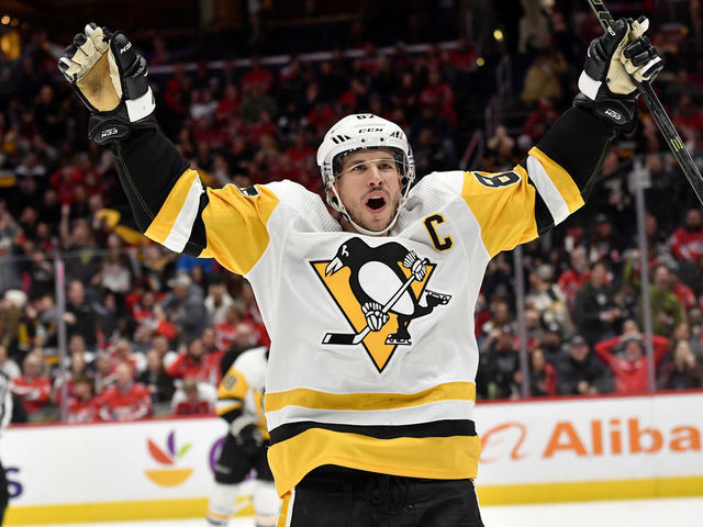 WASHINGTON, DC - JANUARY 26: Penguins center Sidney Crosby (87) celebrates after the Penguins tie the game at 2-2 during the third period during the Pittsburgh Penguins versus Washington Capitals National Hockey League game on January 26, 2023 at Capital One Arena in Washington, D.C..