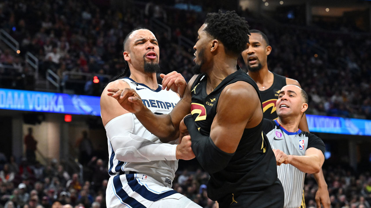 CLEVELAND, OHIO - FEBRUARY 02: Dillon Brooks #24 of the Memphis Grizzlies fights with Donovan Mitchell #45 of the Cleveland Cavaliers during the third quarter at Rocket Mortgage Fieldhouse on February 02, 2023 in Cleveland, Ohio. Both players were ejected.The Cavaliers defeated the Grizzlies 128-113.
