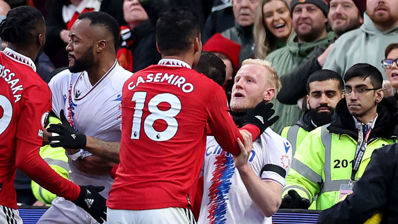 MANCHESTER, ENGLAND - FEBRUARY 04: Casemiro of Manchester United clashes with Will Hughes of Crystal Palace leading to a red card decision during the Premier League match between Manchester United and Crystal Palace at Old Trafford on February 04, 2023 in Manchester, England.