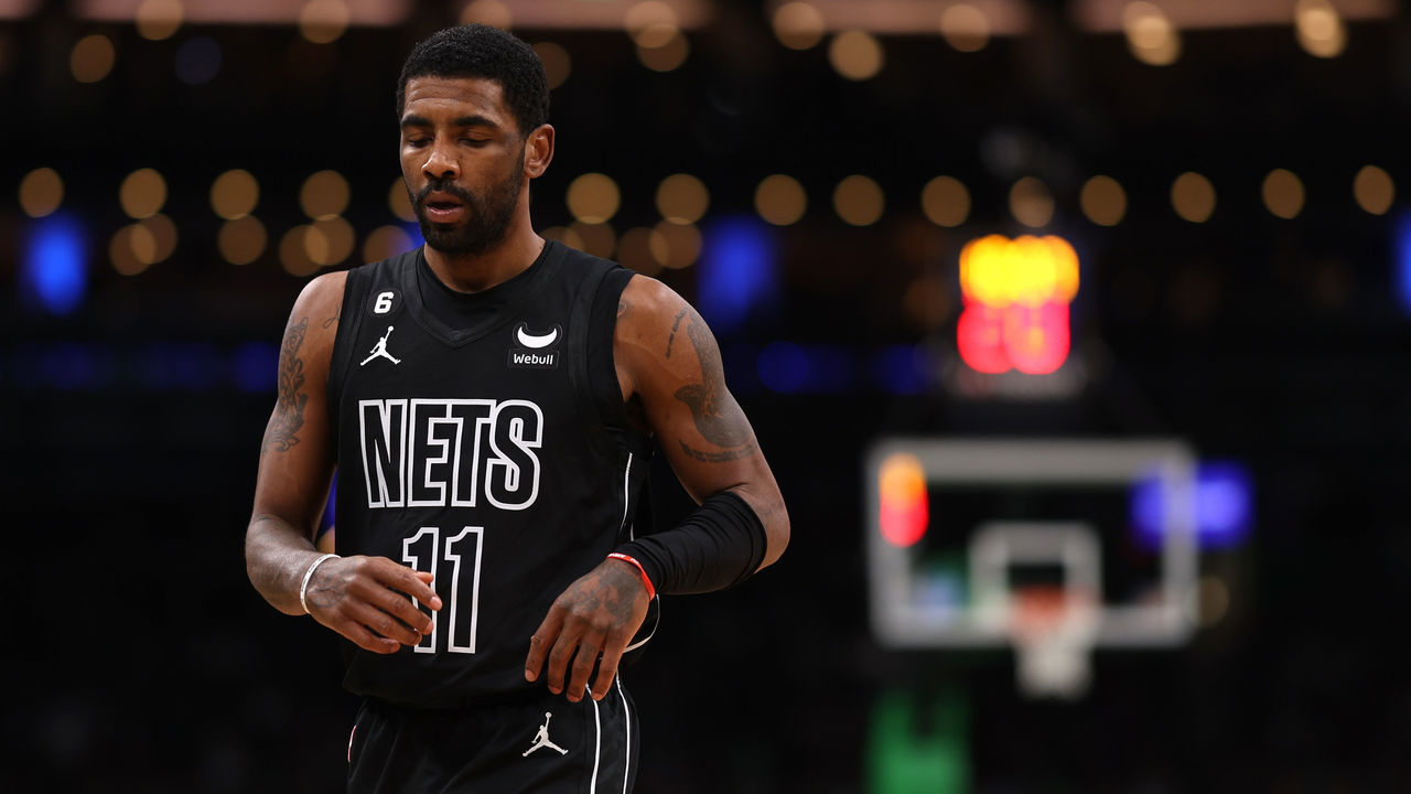 BOSTON, MASSACHUSETTS - FEBRUARY 01: Kyrie Irving #11 of the Brooklyn Nets looks on during the first half against the Boston Celtics at TD Garden on February 01, 2023 in Boston, Massachusetts.