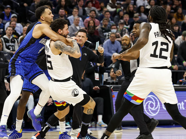 MINNEAPOLIS, MN - FEBRUARY 03: Jalen Suggs #4 of the Orlando Magic and Austin Rivers #25 of the Minnesota Timberwolves get into a scrum as Taurean Prince #12 reacts in the third quarter of the game at Target Center on February 03, 2023 in Minneapolis, Minnesota. Suggs and Rivers were ejected from the game.