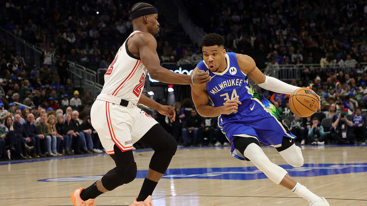 MILWAUKEE, WISCONSIN - FEBRUARY 04: Giannis Antetokounmpo #34 of the Milwaukee Bucks drives to the basket against Jimmy Butler #22 of the Miami Heat during the first half of a game at Fiserv Forum on February 04, 2023 in Milwaukee, Wisconsin.