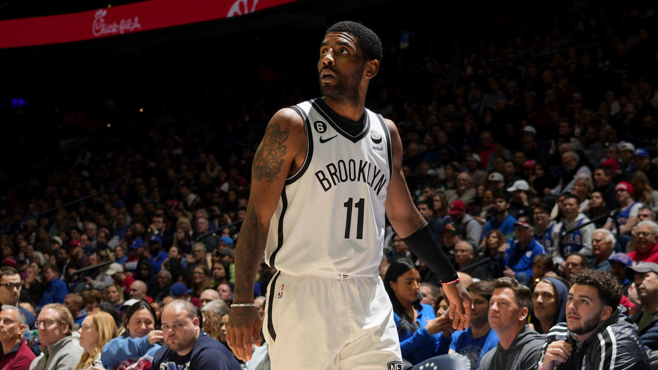 PHILADELPHIA, PA - JANUARY 25: Kyrie Irving #11 of the Brooklyn Nets looks on during the game against the Philadelphia 76ers on January 25, 2023 at the Wells Fargo Center in Philadelphia, Pennsylvania NOTE TO USER: User expressly acknowledges and agrees that, by downloading and/or using this Photograph, user is consenting to the terms and conditions of the Getty Images License Agreement. Mandatory Copyright Notice: Copyright 2023 NBAE