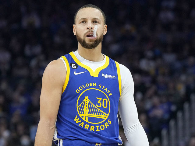 SAN FRANCISCO, CALIFORNIA - JANUARY 27: Stephen Curry #30 of the Golden State Warriors looks on against the Toronto Raptors during the first quarter of an NBA basketball game at Chase Center on January 27, 2023 in San Francisco, California.