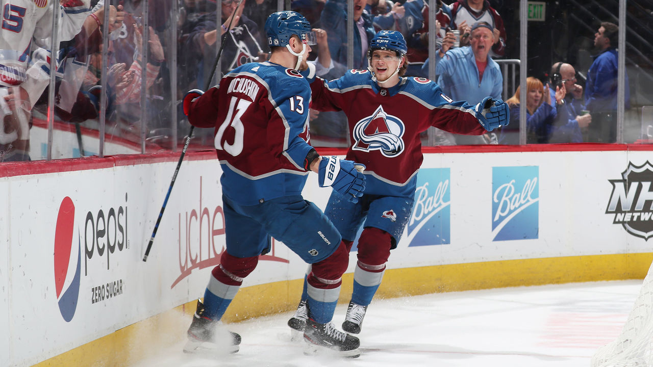 DENVER, COLORADO - APRIL 18: Bowen Byram #4 and Valeri Nichushkin #13 of the Colorado Avalanche celebrate a goal by Nichushkin against the Washington Capitals at Ball Arena on April 18, 2022 in Denver, Colorado.