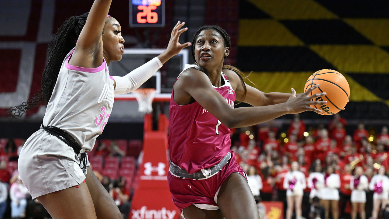 COLLEGE PARK, MARYLAND - FEBRUARY 05: Diamond Miller #1 of the Maryland Terrapins drives to the basket in the third quarter against Cotie McMahon #32 of the Ohio State Buckeyes at Xfinity Center on February 05, 2023 in College Park, Maryland.
