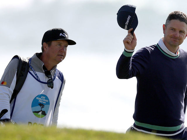 PEBBLE BEACH, CALIFORNIA - FEBRUARY 06: Justin Rose of England waves to applause as he makes his way to the 18th green during the continuation of the final round of the AT&T Pebble Beach Pro-Am at Pebble Beach Golf Links on February 06, 2023 in Pebble Beach, California.