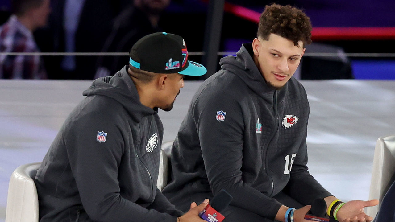 PHOENIX, ARIZONA - FEBRUARY 06: (L-R) Jalen Hurts #1 of the Philadelphia Eagles talks with Patrick Mahomes #15 of the Kansas City Chiefs during Super Bowl LVII Opening Night presented by Fast Twitch at Footprint Center on February 06, 2023 in Phoenix, Arizona.
