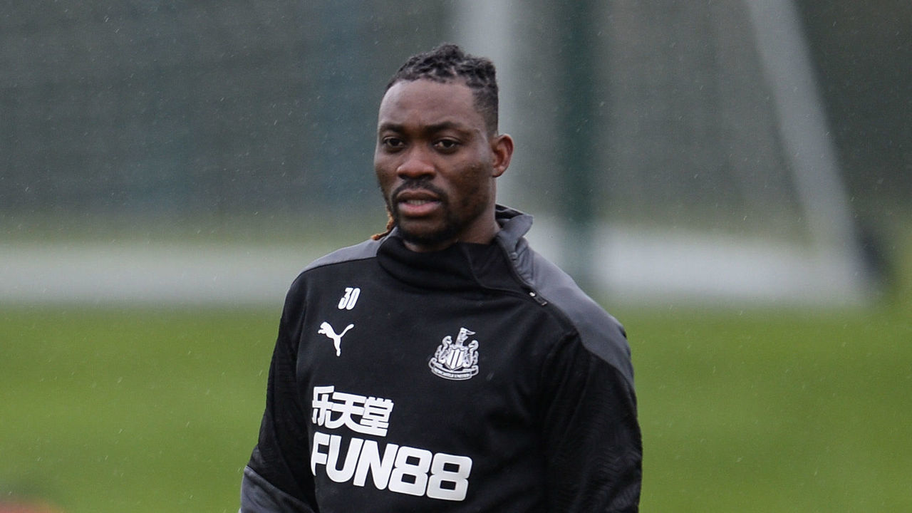 NEWCASTLE UPON TYNE, ENGLAND - JANUARY 28: Christian Atsu stands with training balls during the Newcastle United Training Session at the Newcastle United Training Centre on January 28, 2021 in Newcastle upon Tyne, England.