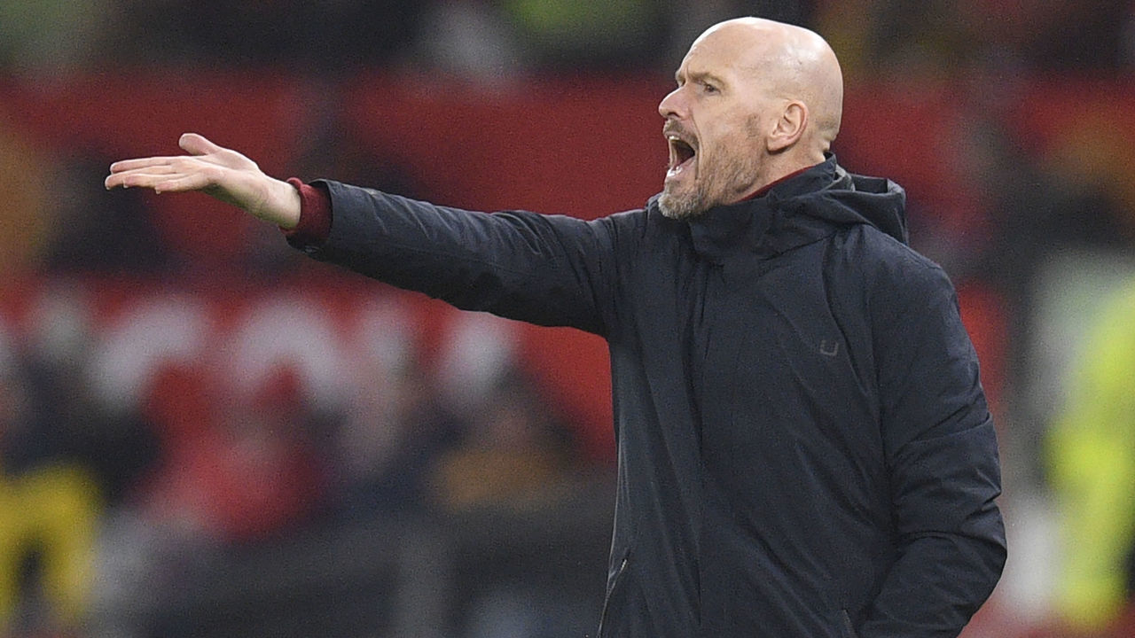 Manchester United's Dutch manager Erik ten Hag gestures on the touchline during the English FA Cup fourth round football match between Manchester United and Reading at Old Trafford in Manchester, north west England, on January 28, 2023. - Man Utd won the game 3-1. - RESTRICTED TO EDITORIAL USE. No use with unauthorized audio, video, data, fixture lists, club/league logos or 'live' services. Online in-match use limited to 120 images. An additional 40 images may be used in extra time. No video emulation. Social media in-match use limited to 120 images. An additional 40 images may be used in extra time. No use in betting publications, games or single club/league/player publications.