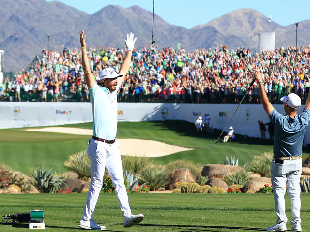 SCOTTSDALE, ARIZONA - FEBRUARY 12: Sam Ryder of the United States reacts to his hole-in-one with Brian Harman of the United States on the 16th hole during the third round of the WM Phoenix Open at TPC Scottsdale on February 12, 2022 in Scottsdale, Arizona.