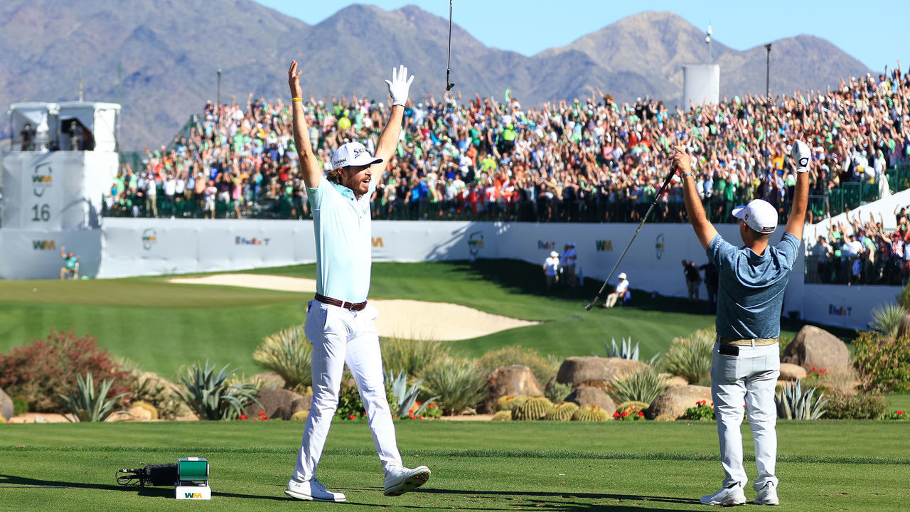 SCOTTSDALE, ARIZONA - FEBRUARY 12: Sam Ryder of the United States reacts to his hole-in-one with Brian Harman of the United States on the 16th hole during the third round of the WM Phoenix Open at TPC Scottsdale on February 12, 2022 in Scottsdale, Arizona.