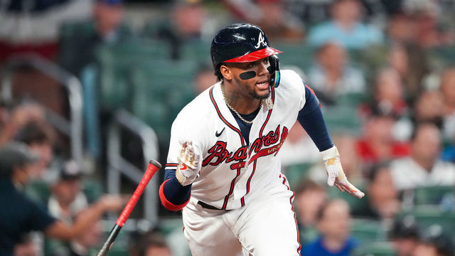 ATLANTA, GA - OCTOBER 12: Ronald Acuna Jr. #13 of the Atlanta Braves hits a single against the Philadelphia Phillies during the fourth inning in game two of the National League Division Series at Truist Park on October 12, 2022 in Atlanta, Georgia.