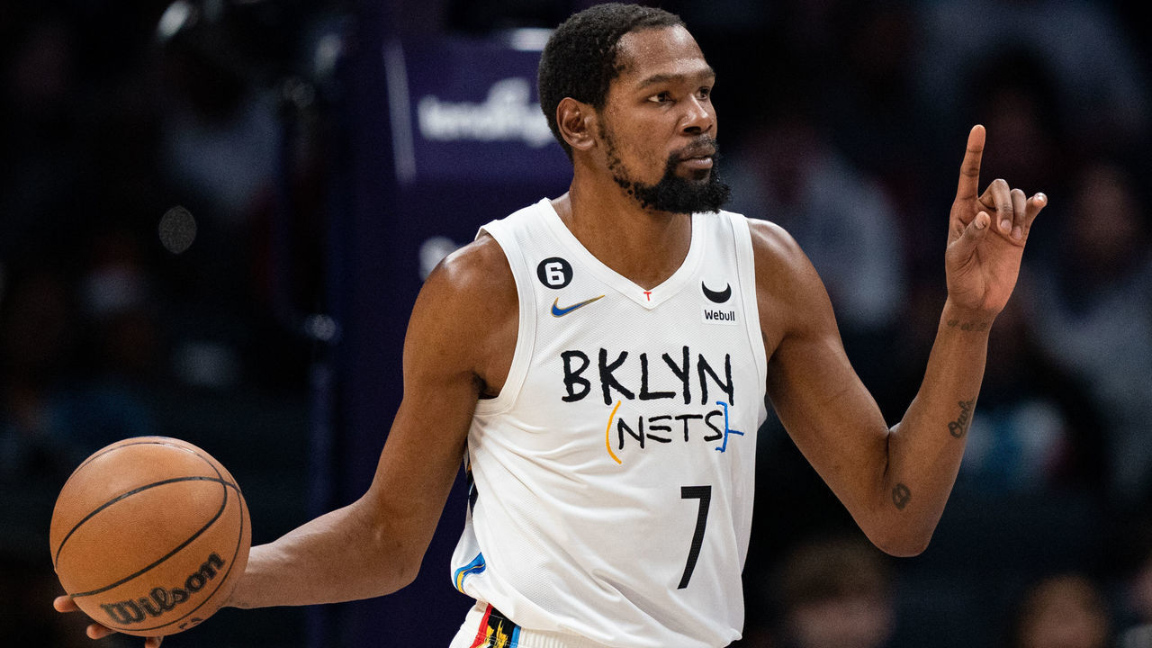 CHARLOTTE, NORTH CAROLINA - DECEMBER 31: Kevin Durant #7 of the Brooklyn Nets brings the ball up court against the Charlotte Hornets during their game at Spectrum Center on December 31, 2022 in Charlotte, North Carolina.