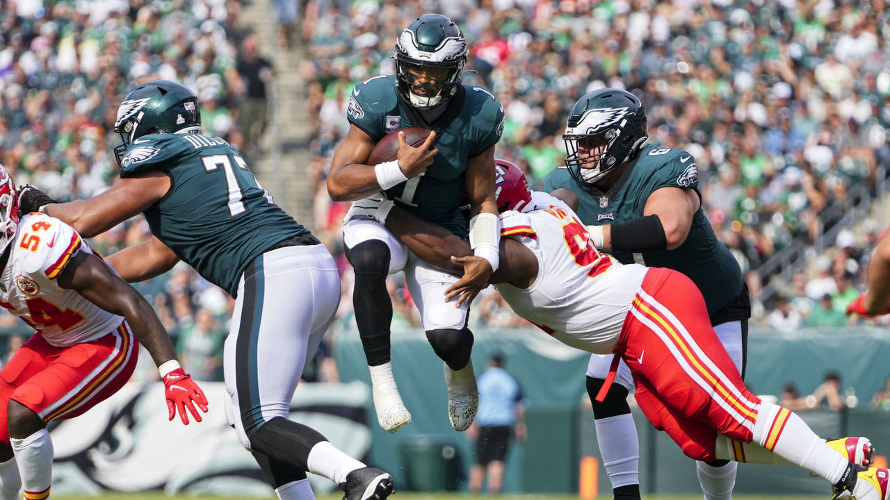 PHILADELPHIA, PA - OCTOBER 03: Philadelphia Eagles quarterback Jalen Hurts (1) leaps for a first down during the game between the Philadelphia Eagles and the Kansas City Chiefs on October 3, 2021 at Lincoln Financial Field in Philadelphia, PA. Photo by Andy Lewis/Icon Sportswire via Getty Images)