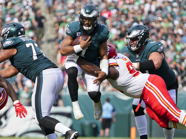 PHILADELPHIA, PA - OCTOBER 03: Philadelphia Eagles quarterback Jalen Hurts (1) leaps for a first down during the game between the Philadelphia Eagles and the Kansas City Chiefs on October 3, 2021 at Lincoln Financial Field in Philadelphia, PA. Photo by Andy Lewis/Icon Sportswire via Getty Images)