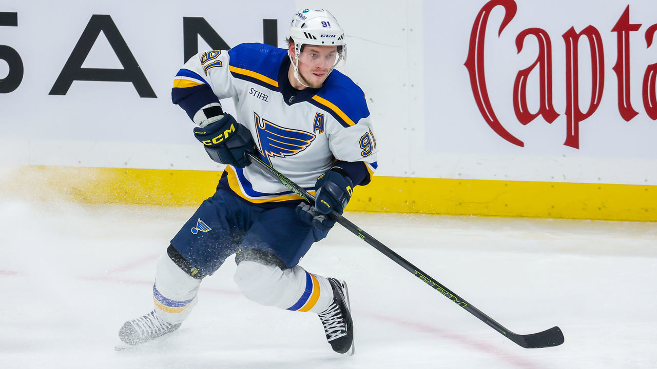 WINNIPEG, CANADA - JANUARY 30: Vladimir Tarasenko #91 of the St. Louis Blues plays the puck during second period action against the Winnipeg Jets at Canada Life Centre on January 30, 2023 in Winnipeg, Manitoba, Canada.
