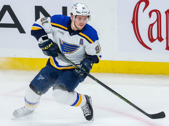 WINNIPEG, CANADA - JANUARY 30: Vladimir Tarasenko #91 of the St. Louis Blues plays the puck during second period action against the Winnipeg Jets at Canada Life Centre on January 30, 2023 in Winnipeg, Manitoba, Canada.