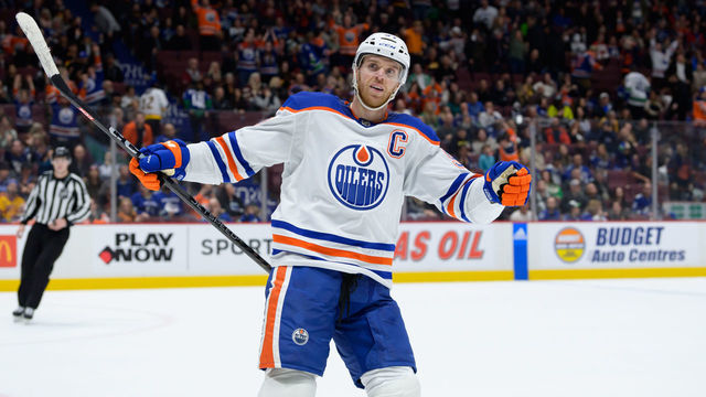 VANCOUVER, BC - JANUARY 21: Edmonton Oilers center Connor McDavid (97) celebrates after a goal during their NHL game against the Vancouver Canucks at Rogers Arena on January 21, 2023 in Vancouver, British Columbia, Canada.