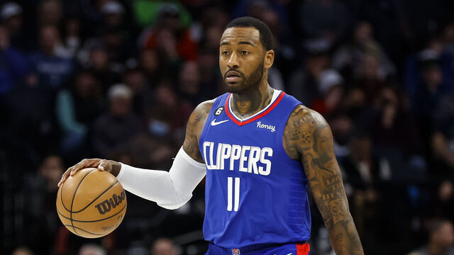 MINNEAPOLIS, MN - JANUARY 06: John Wall #11 of the LA Clippers dribbles the ball through center court against the Minnesota Timberwolves in the third quarter of the game at Target Center on January 6, 2023 in Minneapolis, Minnesota. The Timberwolves defeated the Clippers 128-115.