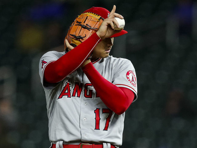 MINNEAPOLIS, MN - SEPTEMBER 23: Shohei Ohtani #17 of the Los Angeles Angels listens to the PitchCom System against the Minnesota Twins in the sixth inning of the game at Target Field on September 23, 2022 in Minneapolis, Minnesota. The Angels defeated the Twins 4-2.