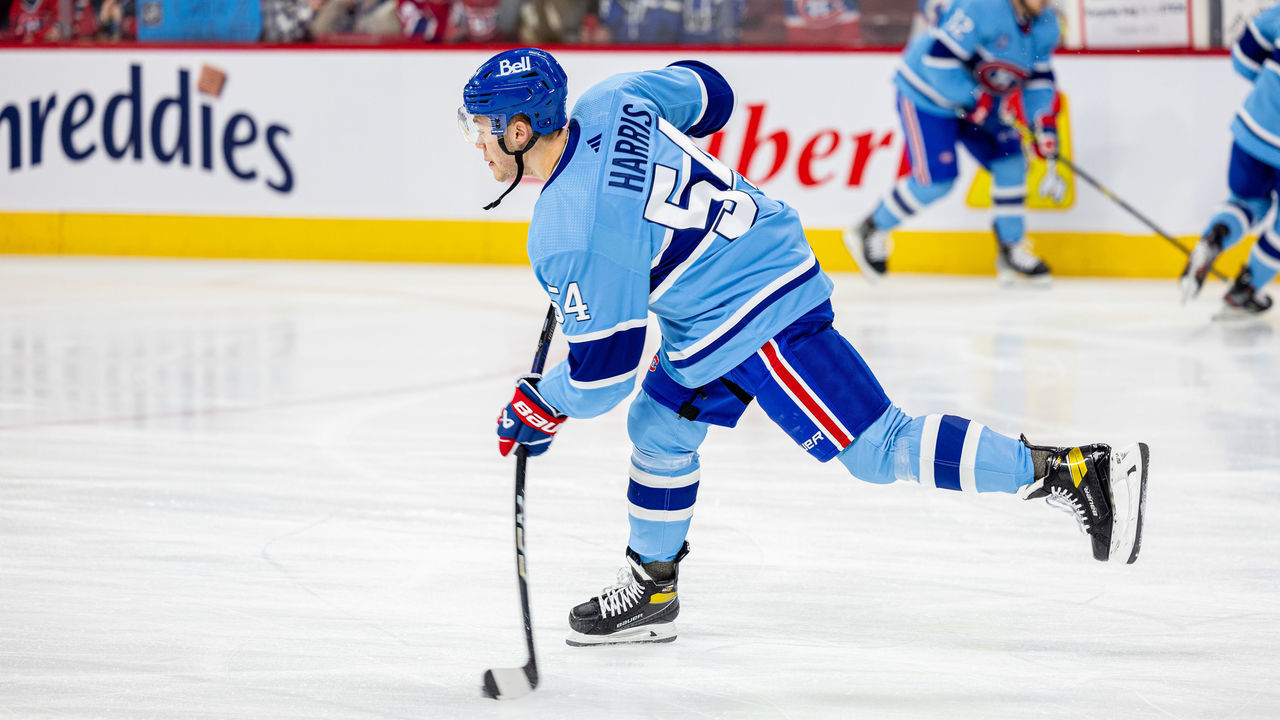MONTREAL, CANADA - JANUARY 26: Jordan Harris #54 of the Montreal Canadiens takes a shot on goal during the warm-up of the NHL regular season game between the Montreal Canadiens and the Detroit Red Wings at the Bell Centre on January 26, 2023 in Montreal, Quebec, Canada.