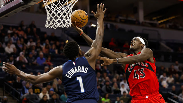 MINNEAPOLIS, MN - JANUARY 19: Pascal Siakam #43 of the Toronto Raptors goes up for a shot against Anthony Edwards #1 of the Minnesota Timberwolves in the first quarter at Target Center on January 19, 2023 in Minneapolis, Minnesota.
