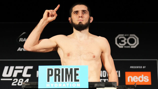 PERTH, AUSTRALIA - FEBRUARY 11: Islam Makhachev of Russia poses on the scale during the UFC 284 official weigh-in at Hyatt Regency Hotel on February 11, 2023 in Perth, Australia.