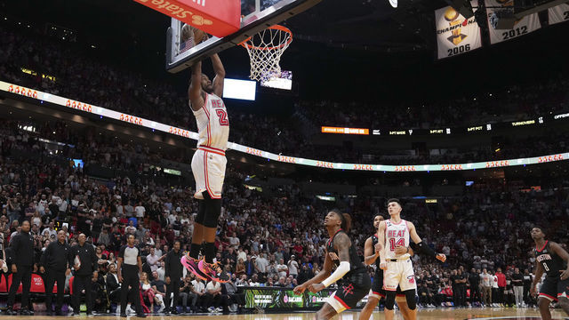 MIAMI, FLORIDA - FEBRUARY 10: Jimmy Butler #22 of the Miami Heat catches an alley-oop with .7 seconds left on the clock in the fourth quarter against the Houston Rockets at Miami-Dade Arena on February 10, 2023 in Miami, Florida. NOTE TO USER: User expressly acknowledges and agrees that, by downloading and or using this photograph, User is consenting to the terms and conditions of the Getty Images License Agreement.
