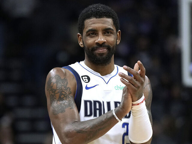 SACRAMENTO, CALIFORNIA - FEBRUARY 10: Kyrie Irving #2 of the Dallas Mavericks looks on clapping against the Sacramento Kings late in the fourth quarter at Golden 1 Center on February 10, 2023 in Sacramento, California.