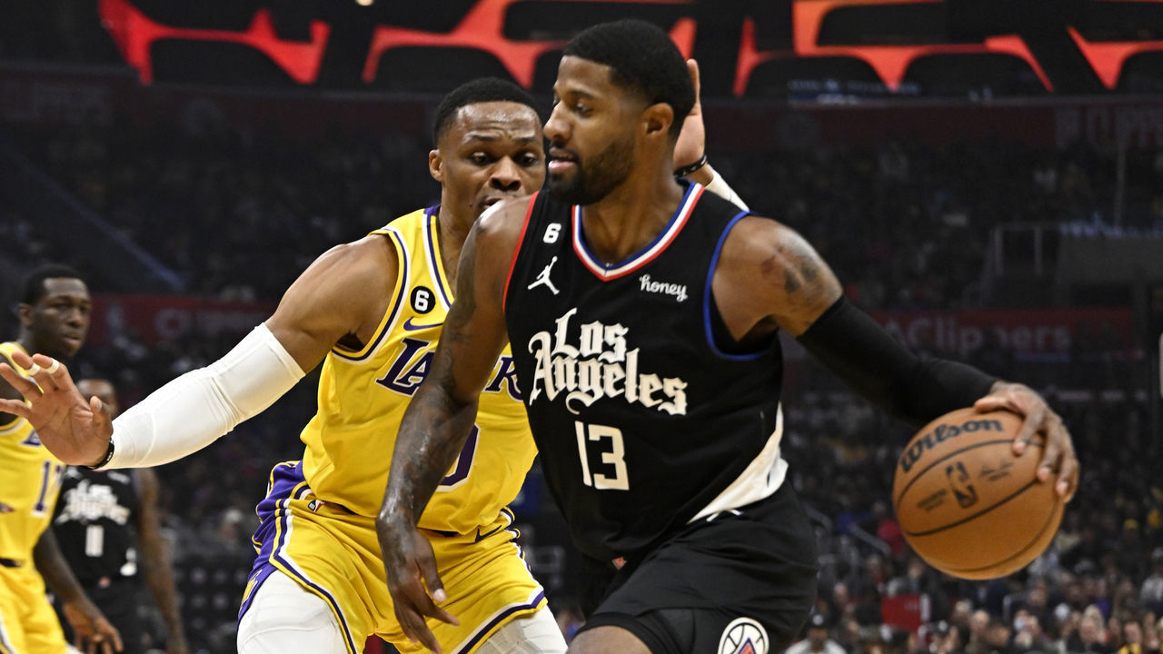 Los Angeles, CA - November 09: Paul George #13 of the LA Clippers drives to the basket against Russell Westbrook #0 of the Los Angeles Lakers in the first half of a NBA basketball game at the Crypto.com Arena in Los Angeles on Wednesday, November 9, 2022.