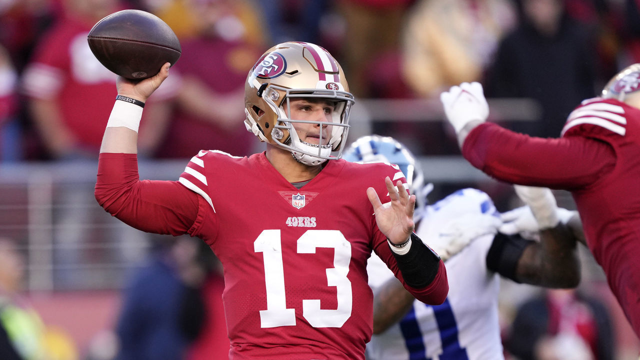SANTA CLARA, CALIFORNIA - JANUARY 22: Brock Purdy #13 of the San Francisco 49ers throws a pass against the Dallas Cowboys during the first quarter in the NFC Divisional Playoff game at Levi's Stadium on January 22, 2023 in Santa Clara, California.