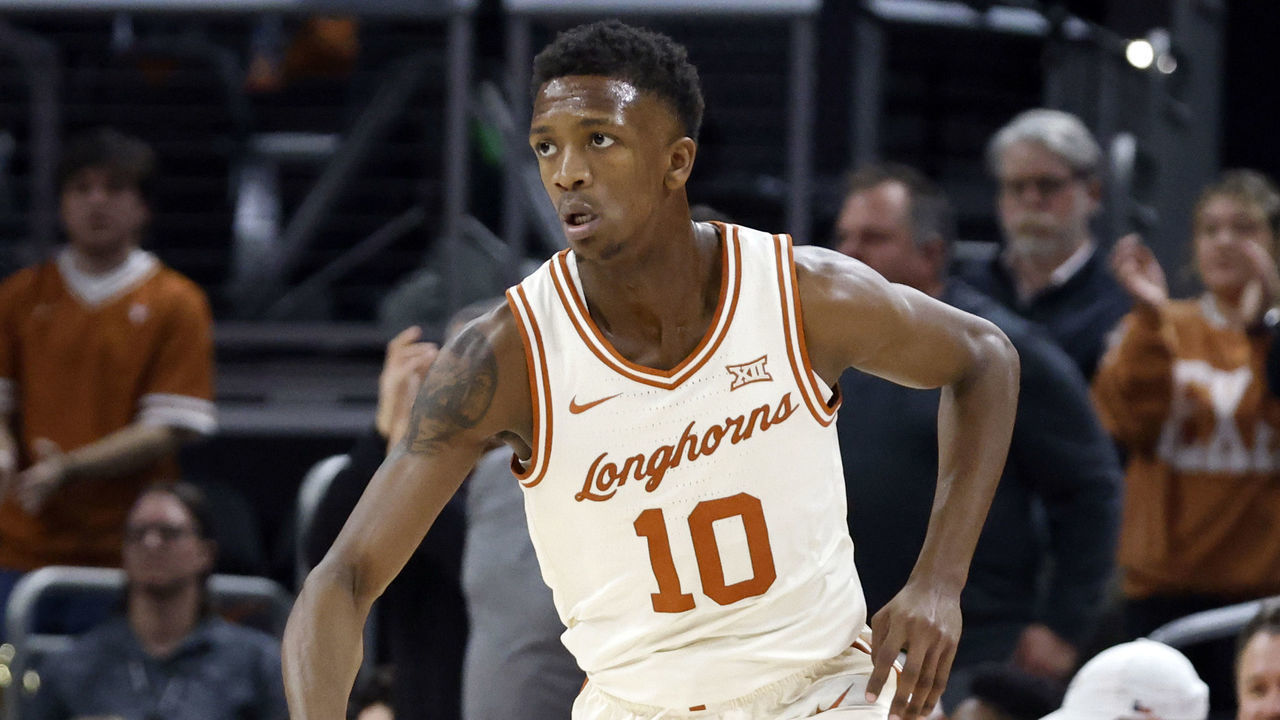 AUSTIN, TX - JANUARY 30: Texas Longhorns guard SirJabari Rice (10) dribbles up the court during the game against the Baylor Bears at the Moody Center in Austin, TX on January 30, 2023.