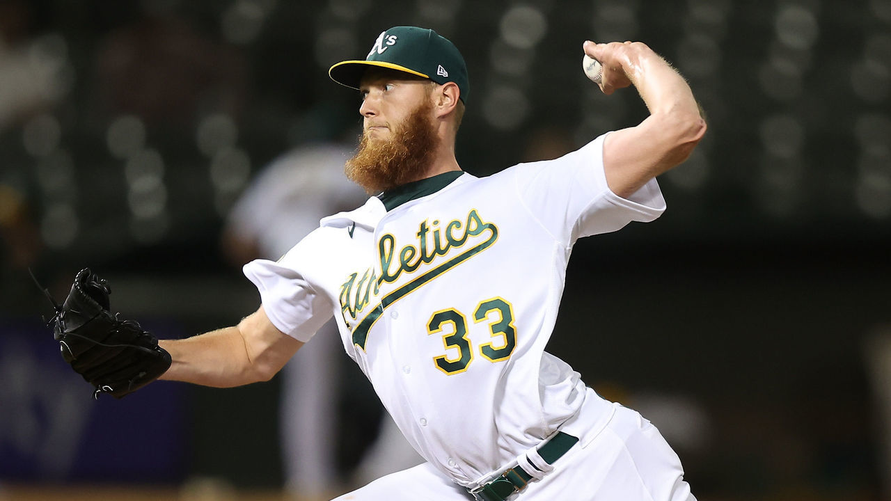OAKLAND, CALIFORNIA - SEPTEMBER 21: A.J. Puk #33 of the Oakland Athletics pitches against the Seattle Mariners at RingCentral Coliseum on September 21, 2022 in Oakland, California.