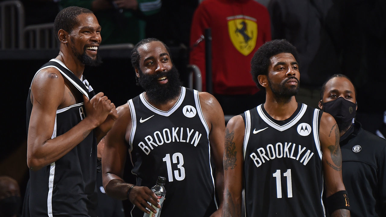 BOSTON, MA - MAY 30: Kevin Durant #7, James Harden #13 and Kyrie Irving #11 of the Brooklyn Nets smile during the game against the Boston Celtics during Round 1, Game 4 of the 2021 NBA Playoffs on May 30, 2021 at the TD Garden in Boston, Massachusetts. Mandatory Copyright Notice: Copyright 2021 NBAE