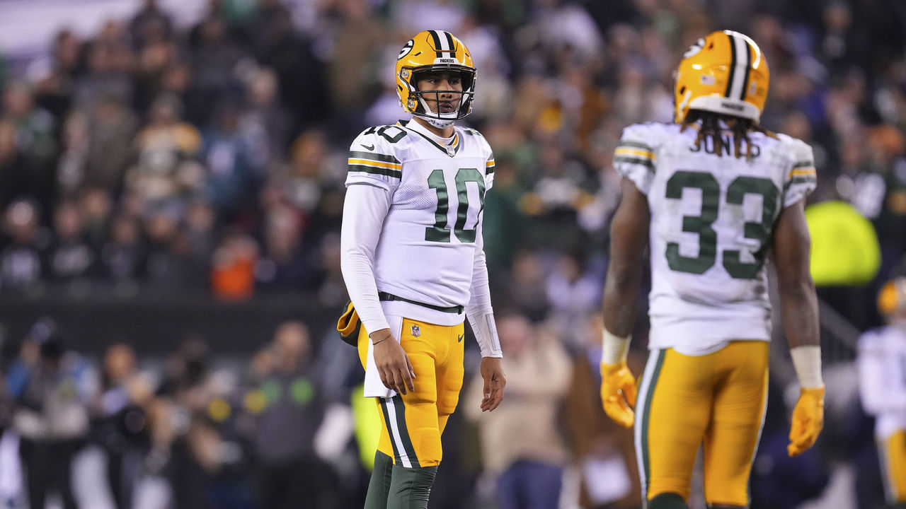 PHILADELPHIA, PA - NOVEMBER 27: Jordan Love #10 and Aaron Jones #33 of the Green Bay Packers look on against the Philadelphia Eagles at Lincoln Financial Field on November 27, 2022 in Philadelphia, Pennsylvania.