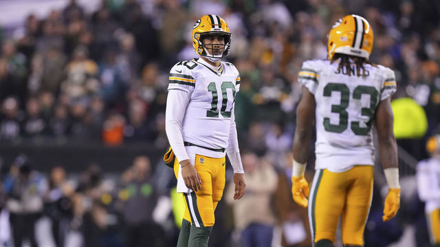 PHILADELPHIA, PA - NOVEMBER 27: Jordan Love #10 and Aaron Jones #33 of the Green Bay Packers look on against the Philadelphia Eagles at Lincoln Financial Field on November 27, 2022 in Philadelphia, Pennsylvania.