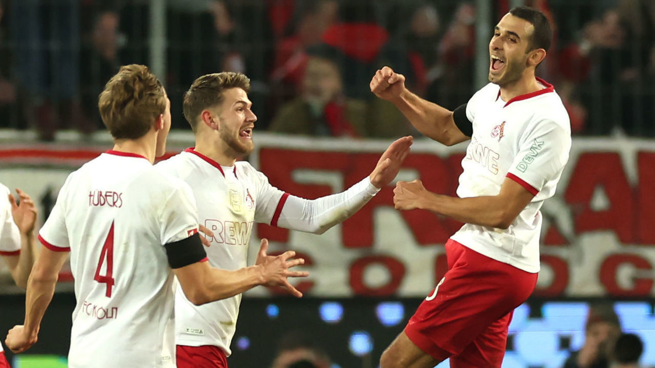 COLOGNE, GERMANY - FEBRUARY 12: Ellyes Skhiri of 1.FC Koln celebrates with teammates after scoring the team's third goal during the Bundesliga match between 1. FC Koeln and Eintracht Frankfurt at RheinEnergieStadion on February 12, 2023 in Cologne, Germany.
